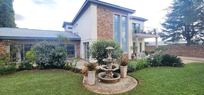 Erasmia House For Sale: 4 Bedrooms, multiple living areas, spacious backyard, and security.