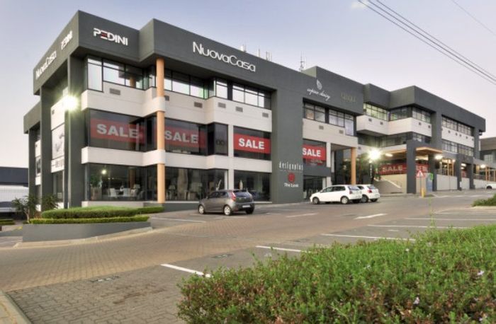 Kramerville Commercial Space To Rent: Unique design hub with cafe and parking options.