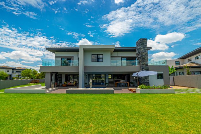 For Sale: House in Lombardy Estate with open plan living, pool, and gardens.