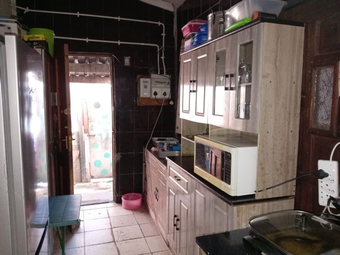 Tafelsig House For Sale: 2 Bedrooms, enclosed utility space, close to amenities.