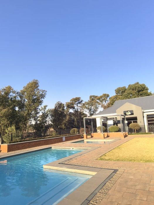 To Rent: Apartment in Modderfontein with pool, gym, and secure access.