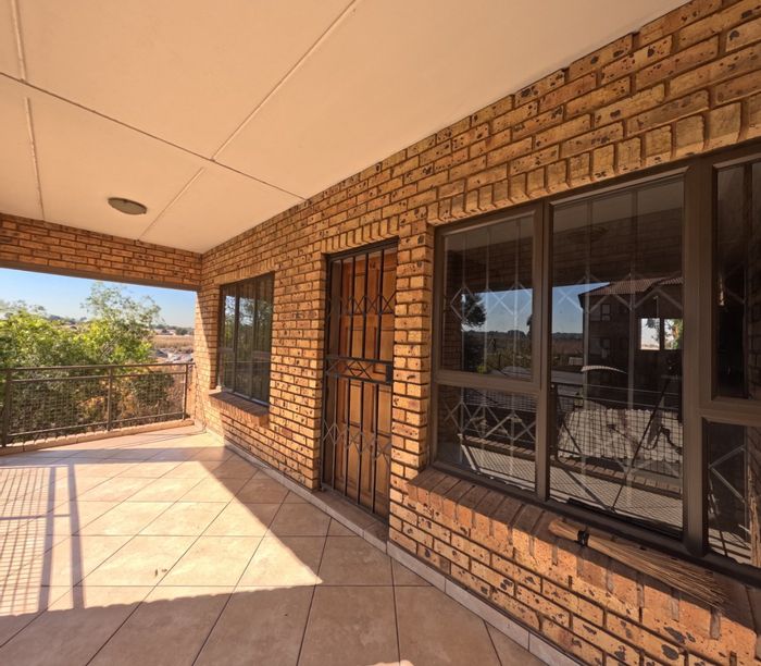 For Sale: 2-bedroom apartment in Klippoortje with open kitchen and scenic views.