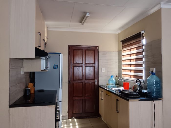 For Sale: 2-bedroom house in Soshanguve Ext with secure parking and garden.