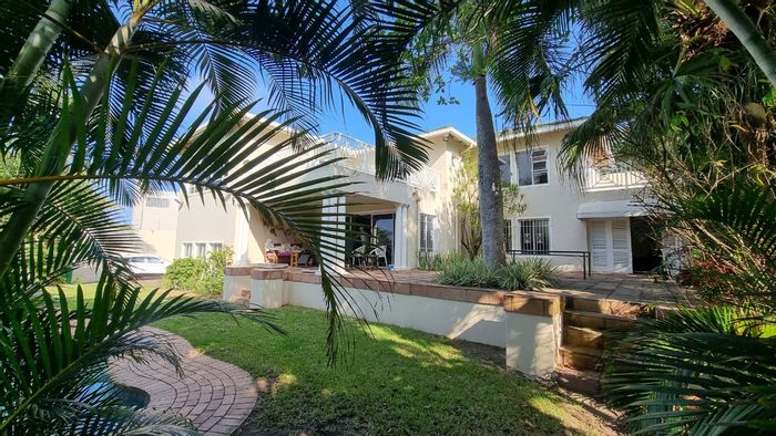 For Sale: House in Umhlanga Central with 4 beds, pool, sea views, and garage.
