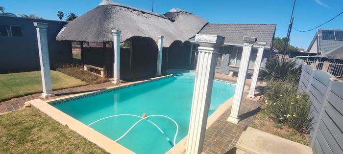 For Sale: Spacious 4-bedroom house in Wilkoppies with flatlet and ample parking.