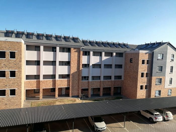 For Sale: Riverside View Apartment with 2 Bedrooms, Secure Parking, and Prepaid Electricity.