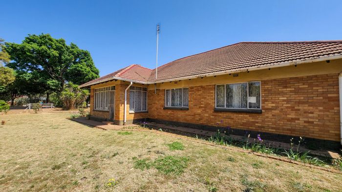 For Sale: House in Stilfontein Ext 4 with 3 beds, garage, and spacious layout.