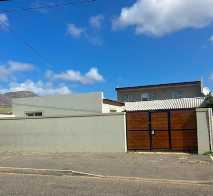 Versatile Steenberg house for sale with multiple entrances and secure parking.
