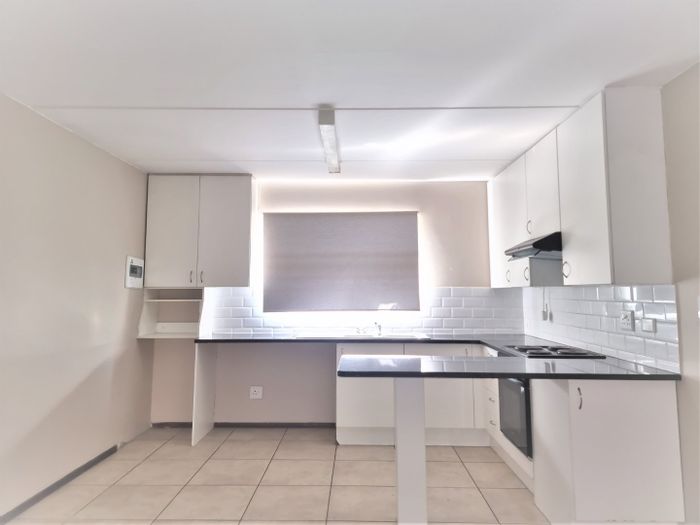 For Sale: Buccleuch Townhouse with pool, gardens, and excellent security features.