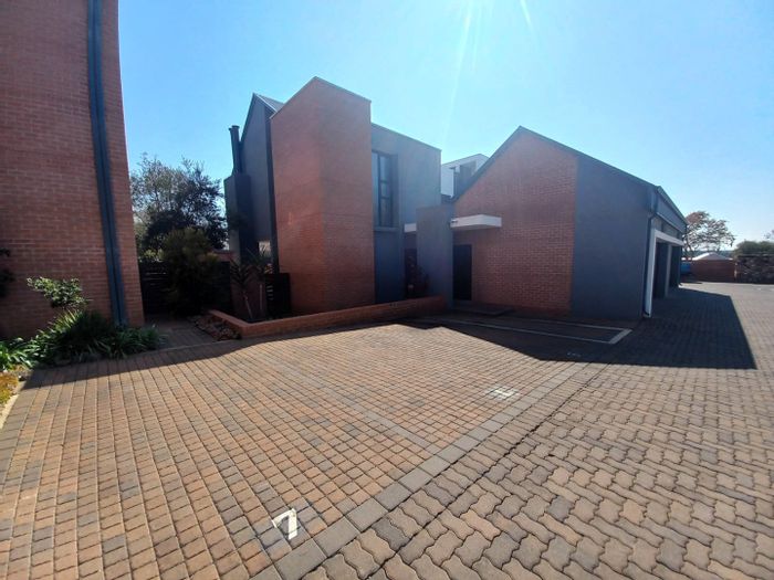 For Sale: Townhouse in Southdowns Estate with private garden, double garage, and security.