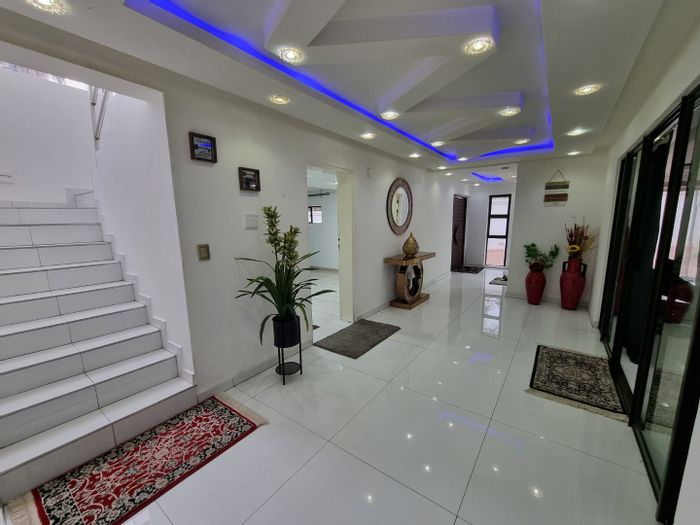 Spacious 6-bedroom house in Bedfordview Central with double garages and outdoor patio.