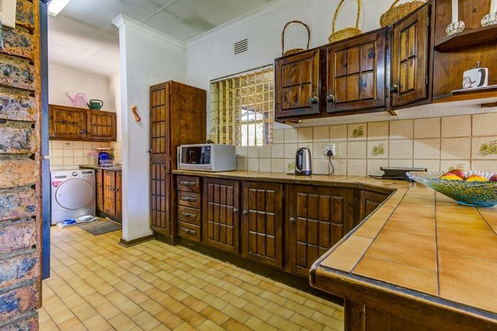 For Sale: House in Sunward Park with pool, 3 bedrooms, 3-car garage.