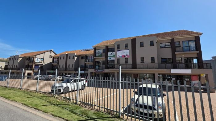 Commercial property for sale near Diaz Beach with open space and parking.