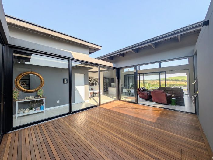 For Sale: House in Sibaya Precinct with 4 en-suite bedrooms and estate amenities.