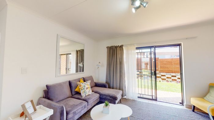 4-Bedroom Apartment To Rent in Monavoni with private garden and security features.