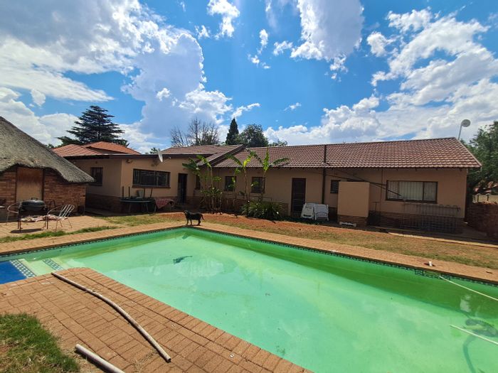 For Sale: Spacious 4-bedroom house with lapa and double garage in Stilfontein Ext 4.
