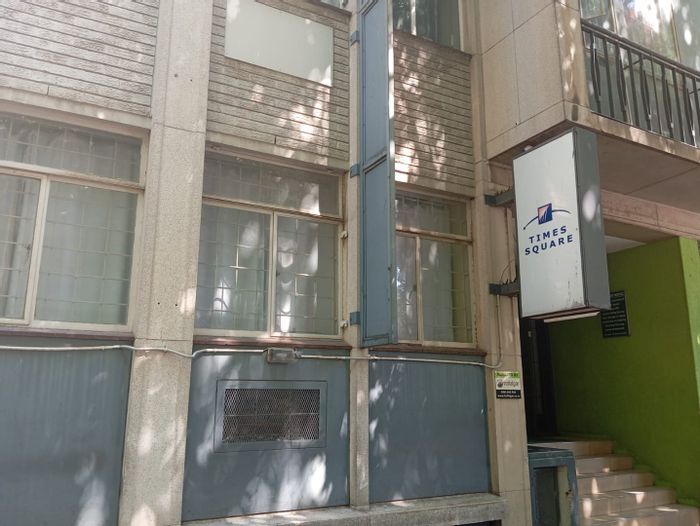 Braamfontein Apartment For Sale: Prime location, near colleges, Gautrain access, vibrant amenities.