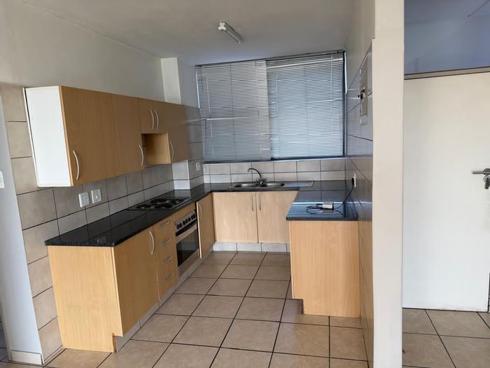 2 Bedroom Apartment To Rent in Elma Park with open-plan kitchen and basement parking.