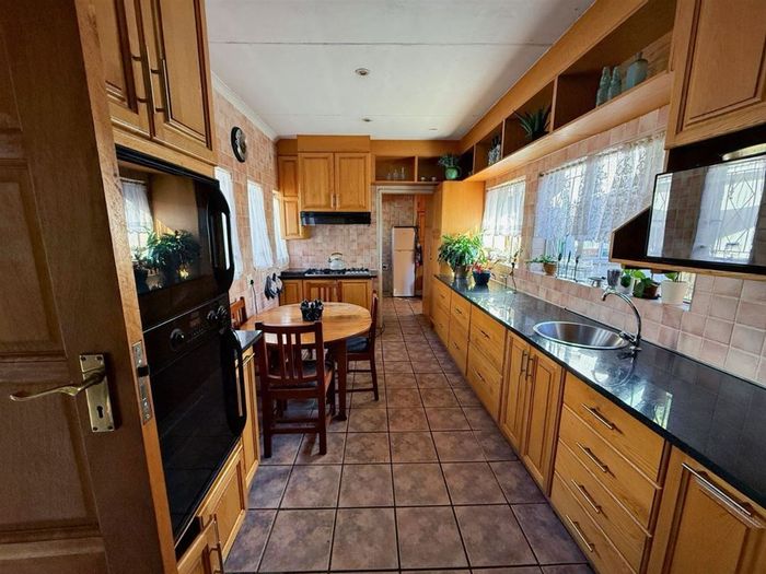 For Sale: House in Van Riebeeck Park with 4 beds, pool, study, and 2 garages.