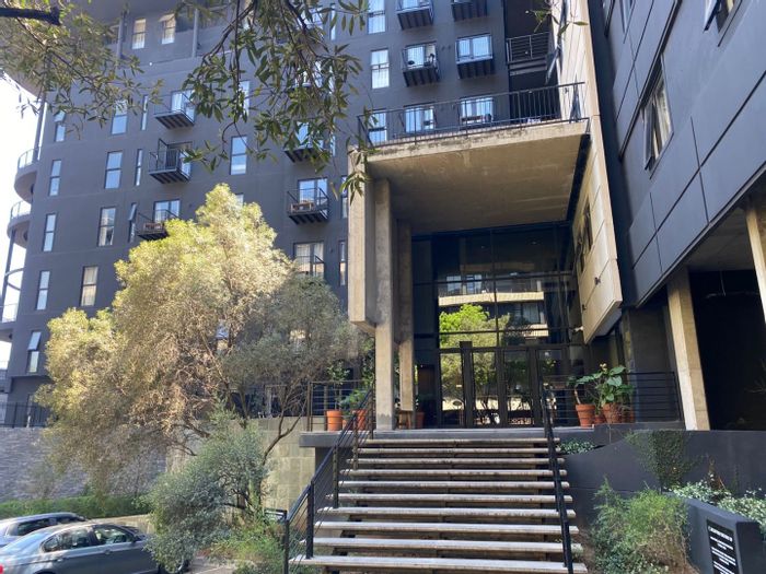 1-Bedroom Apartment To Rent in Sandton Central with rooftop pool and co-working spaces.