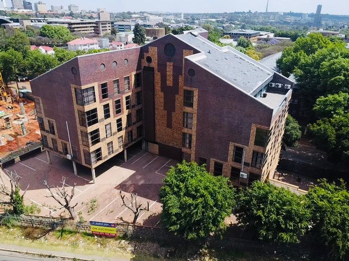 Prime Parktown commercial property for sale, 1,550 sqm office space, parking included.