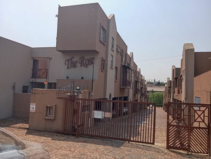 For Sale: Townhouse in Corlett Gardens with balcony, secure parking, and play area.