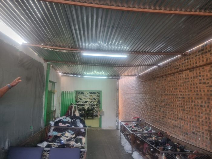 Commercial property for sale in Polokwane Central: Four shops, two bathrooms, yard.