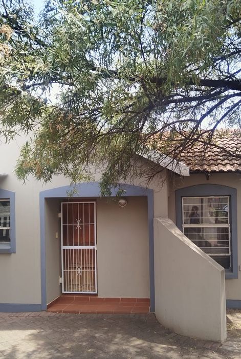 House To Rent in Brits Central: 3 beds, 2 baths, secure estate, garage.