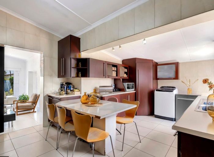 For Sale: House in Sophiatown with garden, bachelor pad, and secure parking.