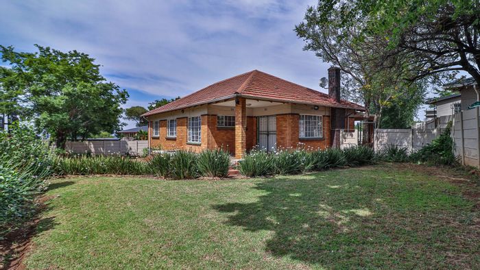 3-Bedroom House For Sale in Primrose with garden, garage, and security features.