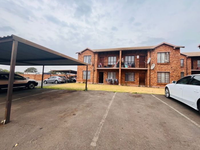 Chloorkop Apartment For Sale: 2 Bedrooms, balcony, open-plan living, investment potential.