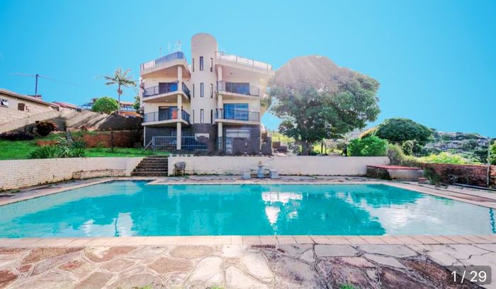 For Sale: Spacious 5-bedroom house in Stanger Manor with pool and rooftop views.