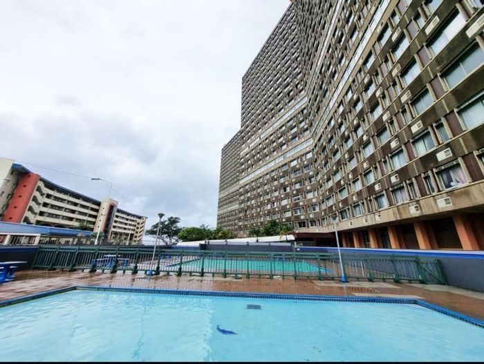 For Sale: 2-bedroom apartment in Amanzimtoti with pool, parking, and beach access.