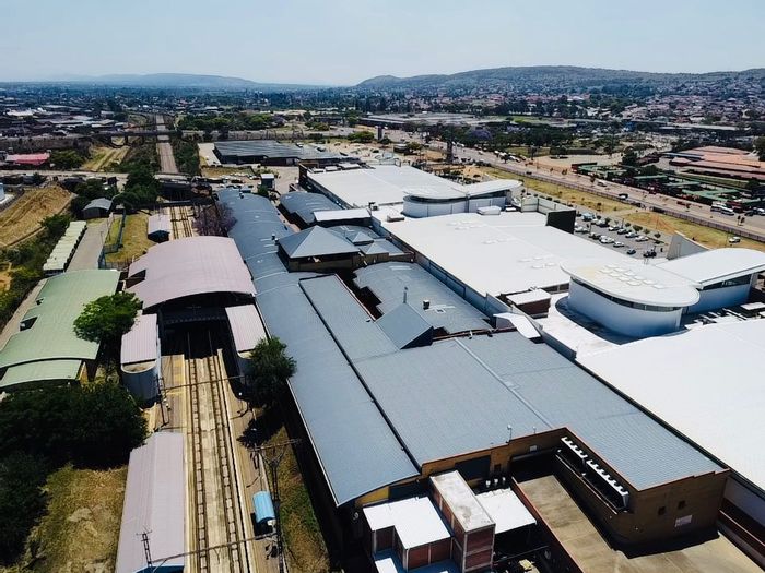 For Sale: Commercial Strip Mall in Mamelodi West with high foot traffic and diverse tenants.