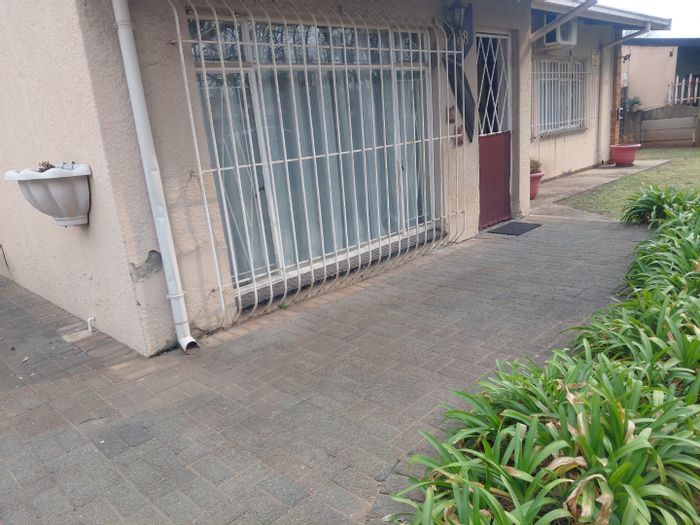 For Sale: House in Sasolburg Ext 12 with 3 bedrooms, garage, and spacious garden.