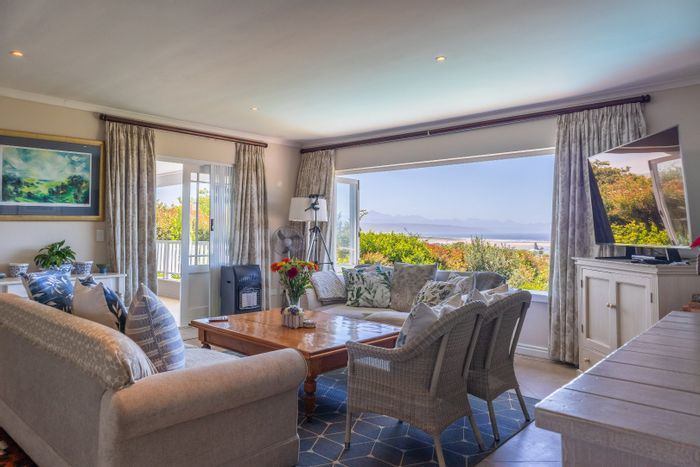 For Sale: House in Plettenberg Bay Central with lagoon views, pool, and ample parking.