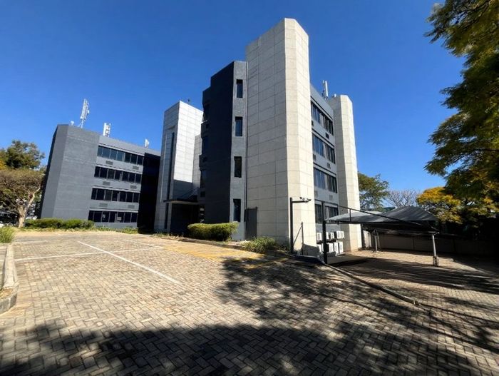 Rivonia Commercial Property For Sale: Tenanted, prime location, ample parking, and accessibility.