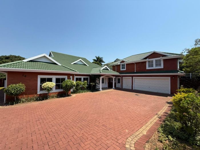 House To Rent in Mount Edgecombe Country Club Estate with pool, flatlet, and security.