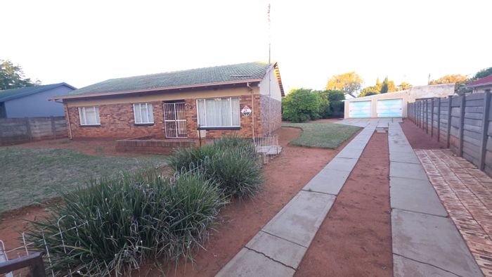 3-Bedroom House for Sale in Stilfontein Ext 4 with Garden and Security Features.