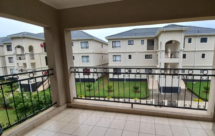 For Sale: Apartment in Carlswald with balcony, pool, clubhouse, and parking.