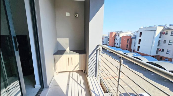 1-Bedroom Apartment For Sale in Sebenza with pool, balcony, and secure access.