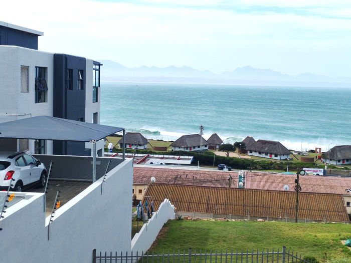 De Bakke Apartment For Sale: 2-bed, sea views, rental income, secure complex.