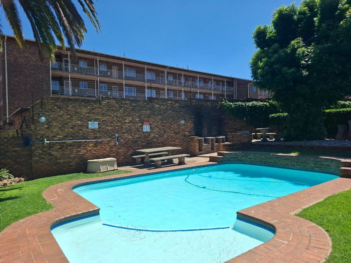 Eastleigh Townhouse For Sale: 2 beds, pool, braai area, near schools and mall.