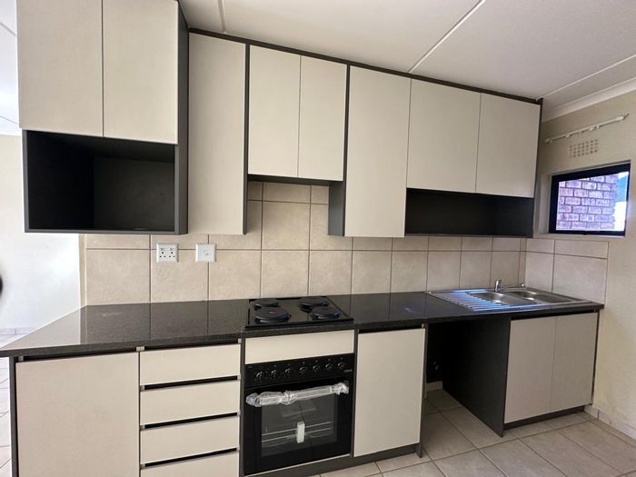 2-Bedroom Apartment To Rent in Rynfield AH with garden, security, and parking.