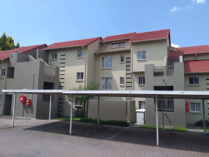 2 Bedroom Apartment To Rent in Paulshof with pool, squash court, and balcony.