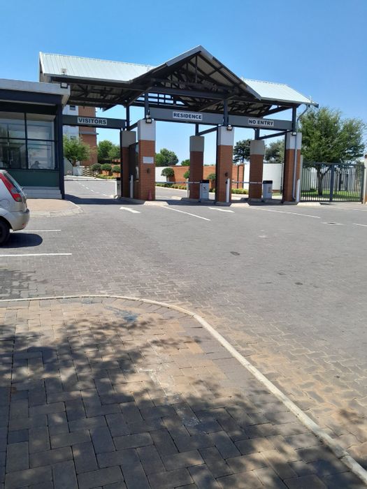 1-Bedroom Apartment For Sale in Founders Hill with pool, barbecue area, and carport.