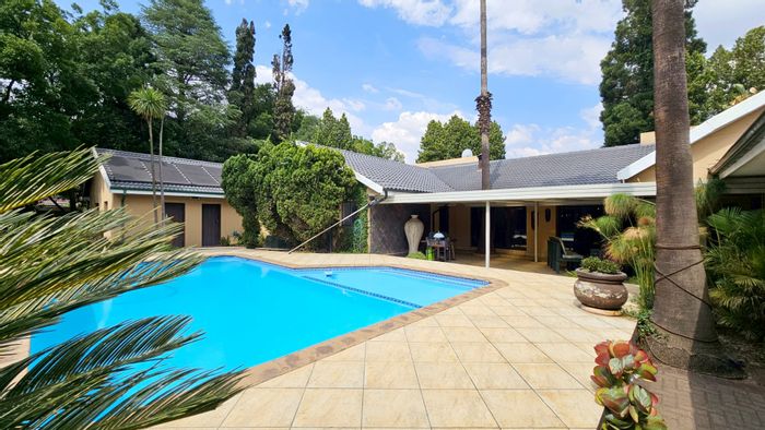 For Sale: Spacious house in Three Rivers Proper with pool, sauna, and double garages.