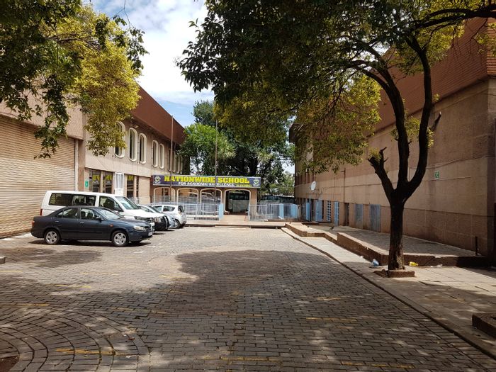 Prime Jeppestown commercial property for sale with multiple entrances and ample parking.