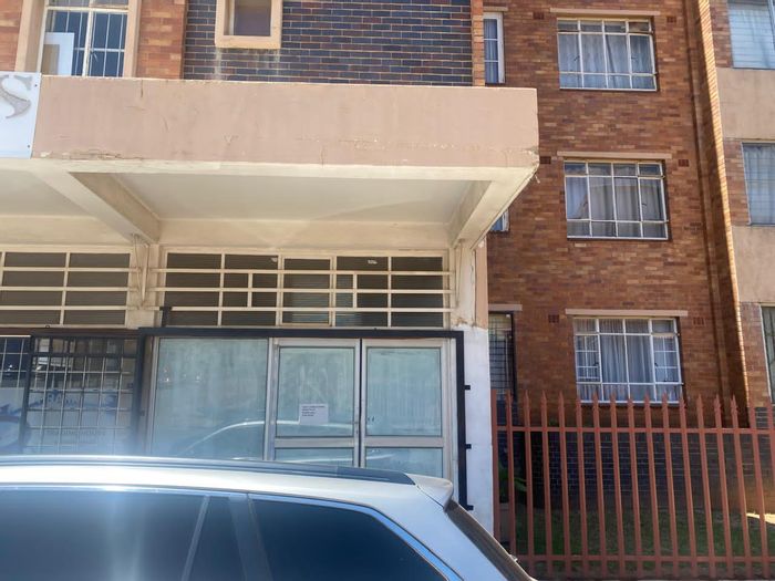 Commercial space to rent in Springs Central with security features and built-in sink.