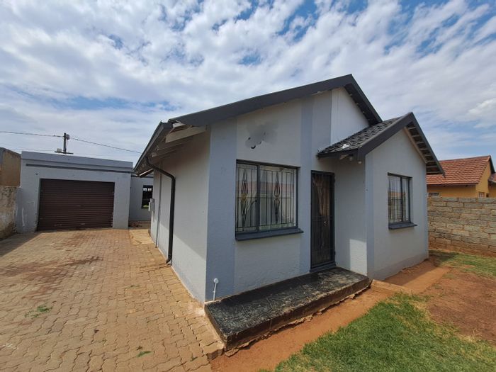 2-Bedroom House in Protea Glen For Sale with Rental Potential and Secure Yard.